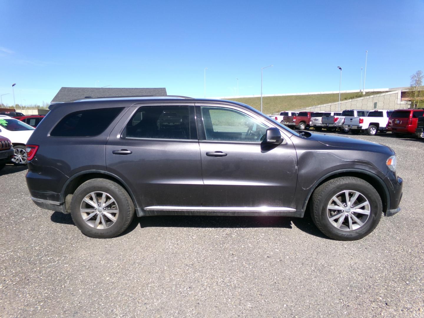 2016 Black /Black Dodge Durango Limited AWD (1C4RDJDG4GC) with an 3.6L V6 DOHC 24V engine, 8A transmission, located at 2630 Philips Field Rd., Fairbanks, AK, 99709, (907) 458-0593, 64.848068, -147.780609 - Photo#2